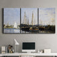 Three-panel canvas wall art featuring small pleasure boats on calm water, displayed above a desk in a home office.