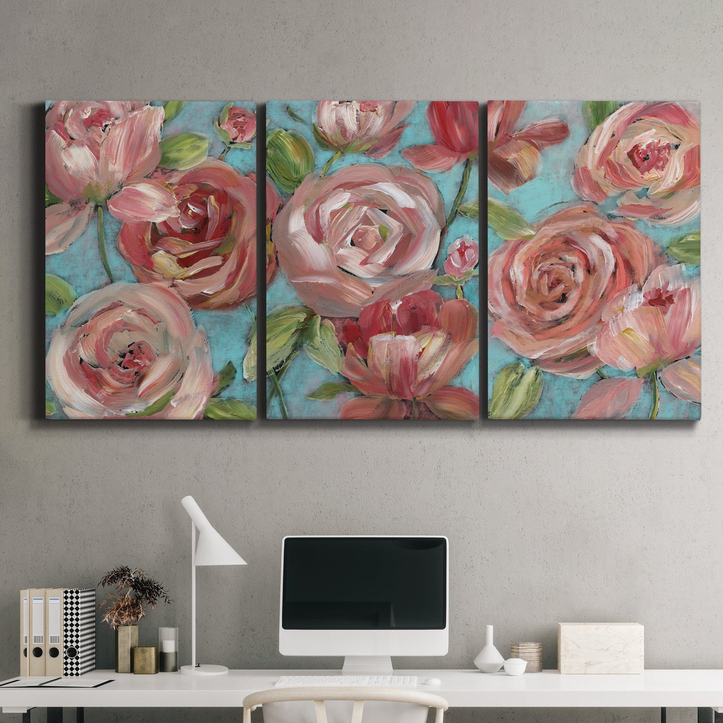 Three-panel canvas wall art featuring playful peach toned floral composition, displayed above a desk in a home office.