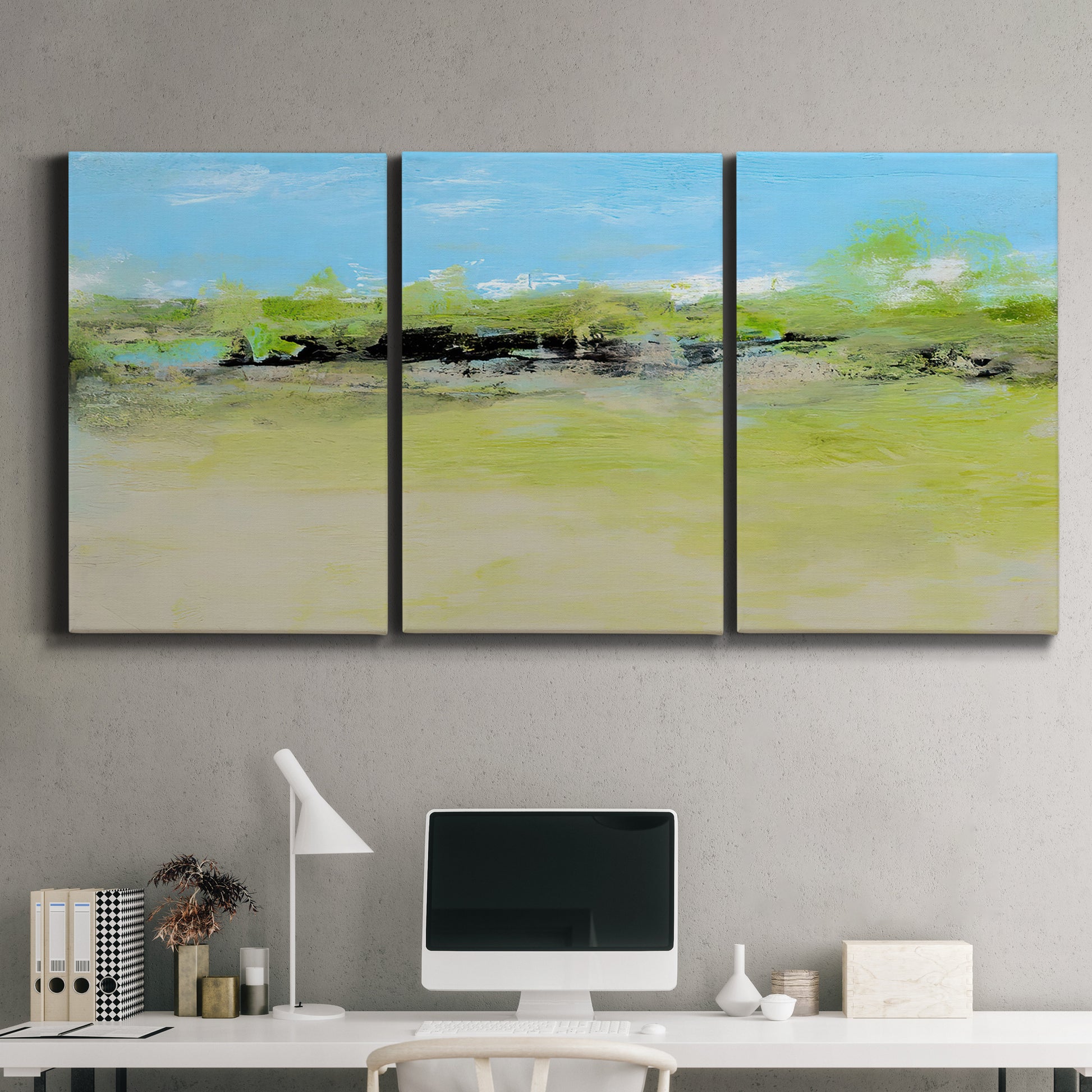 Three-panel canvas wall art featuring abstract terrace landscape view, displayed above a desk in a home office.