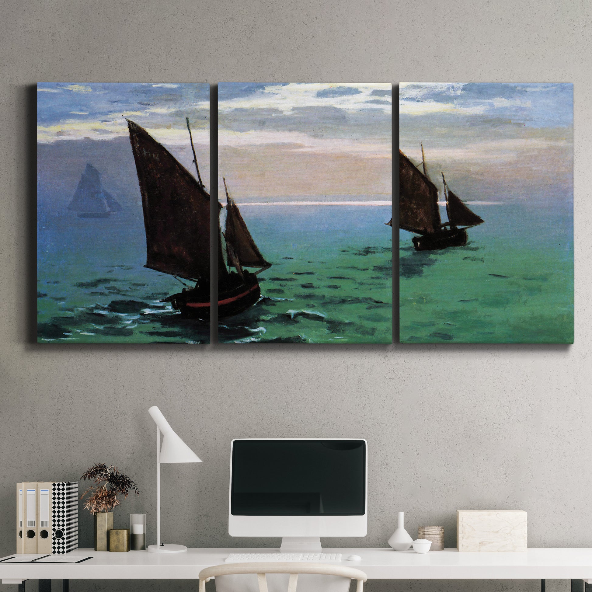 Three-panel canvas wall art featuring fishing boats moving through open sea, displayed above a desk in a home office.