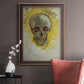 Expressive skull study painting by Vincent van Gogh in an ornate bronzed mahogany wood frame displayed in a neutral interior setting.