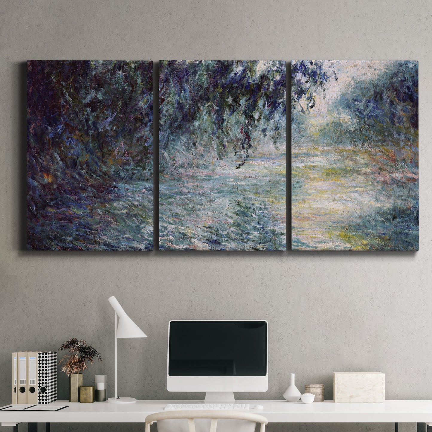 Three-panel canvas wall art featuring misty river scene in morning light, displayed above a desk in a home office.
