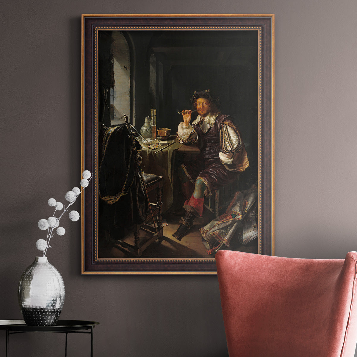 Classical portrait of a soldier smoking a pipe by Frans van Mieris the Elder in an ornate bronzed mahogany wood frame displayed in a neutral interior setting.