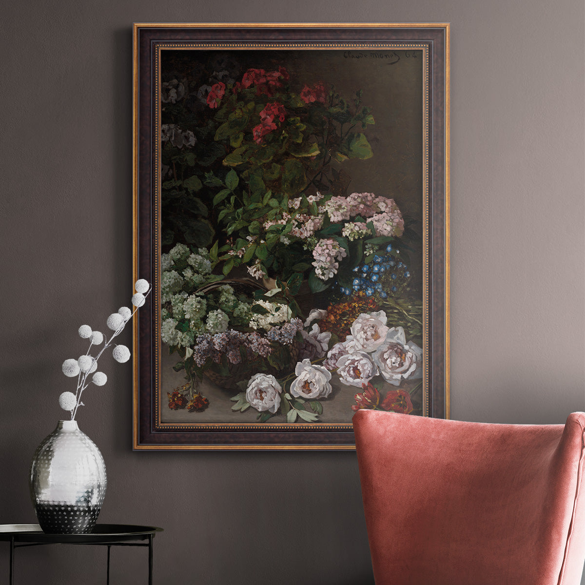 Early impressionist floral painting by Claude Monet in an ornate bronzed mahogany wood frame displayed in a neutral interior setting.