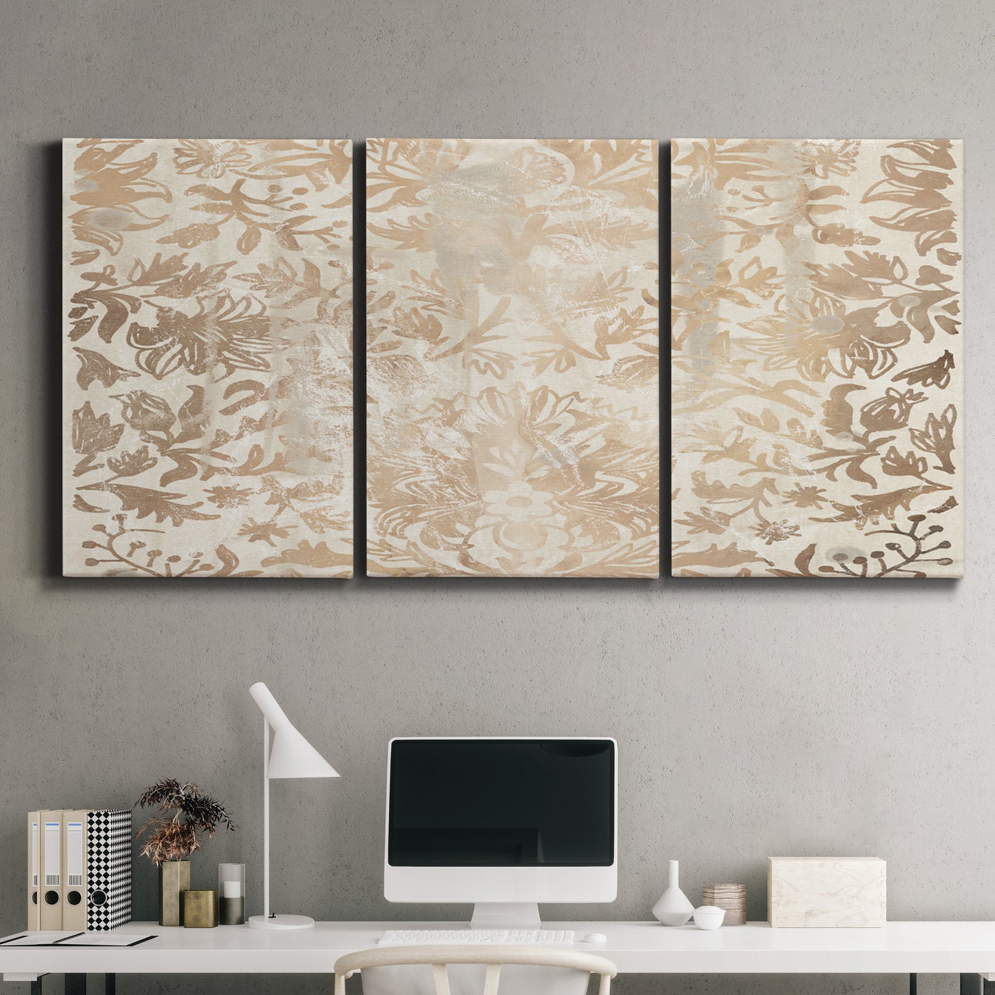 Three-panel canvas wall art featuring ornamental damask abstract pattern, displayed above a desk in a home office.
