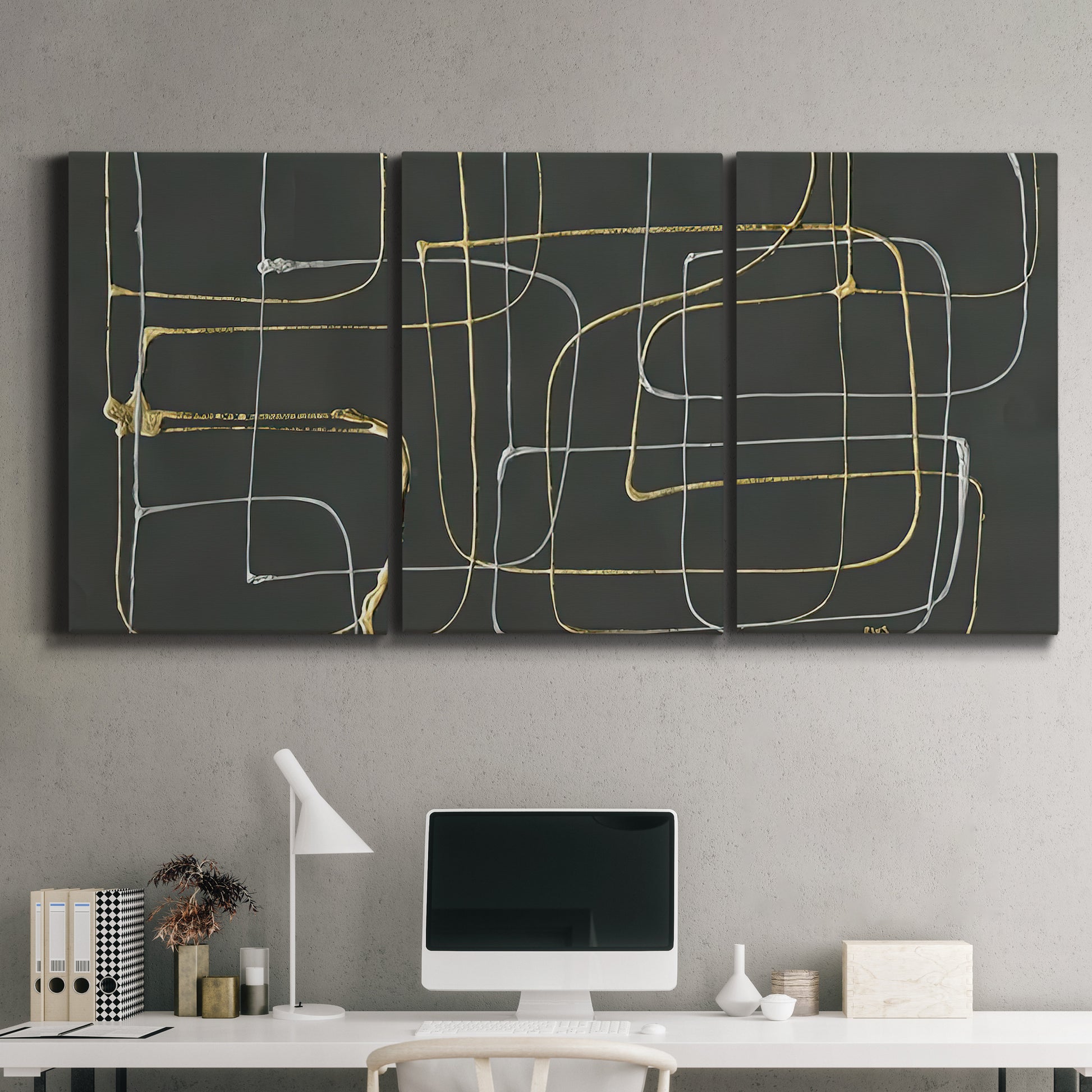 Three-panel canvas wall art featuring linear abstract conduit pattern, displayed above a desk in a home office.
