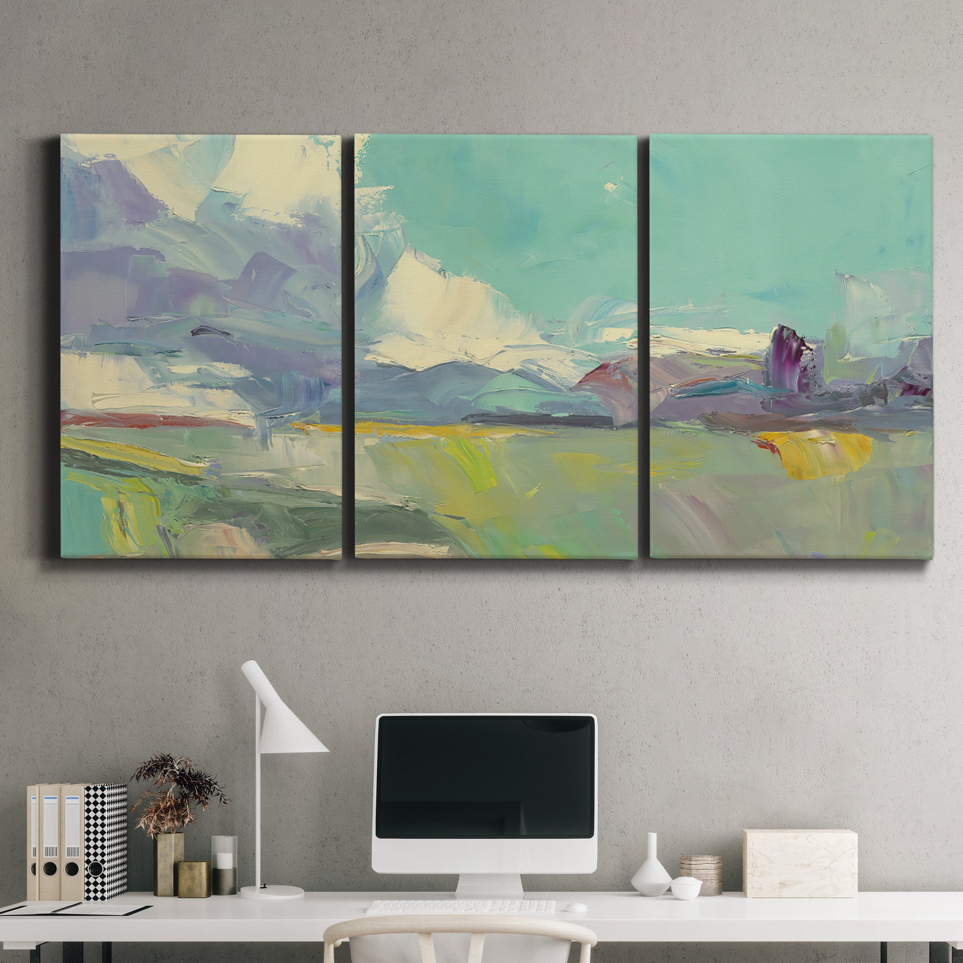 Three-panel canvas wall art featuring road stretching through open countryside, displayed above a desk in a home office.