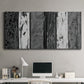 Three-panel canvas wall art featuring brushed metallic abstract textures, displayed above a desk in a home office.