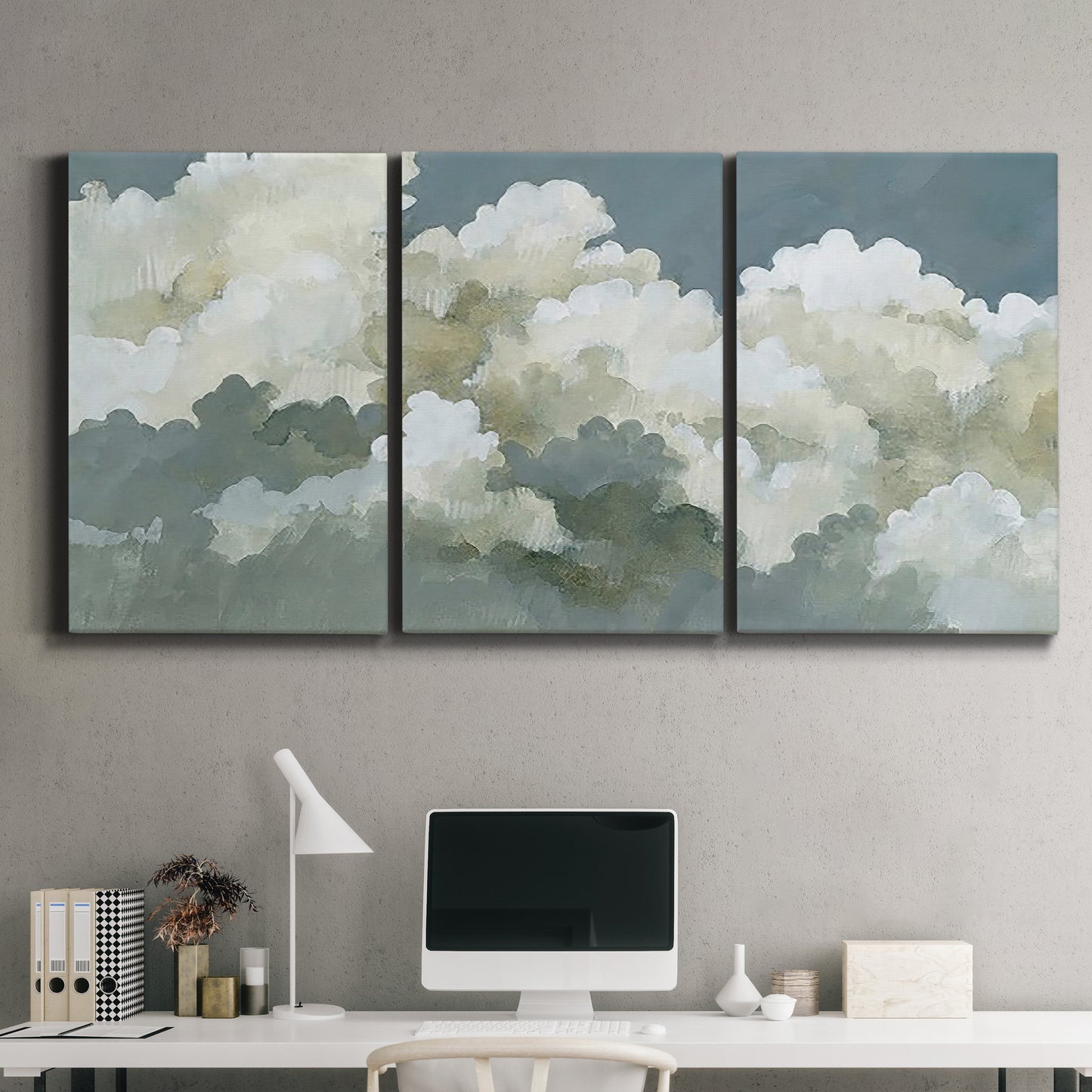 Three-panel canvas wall art featuring abstract evening landscape with depth, displayed above a desk in a home office.