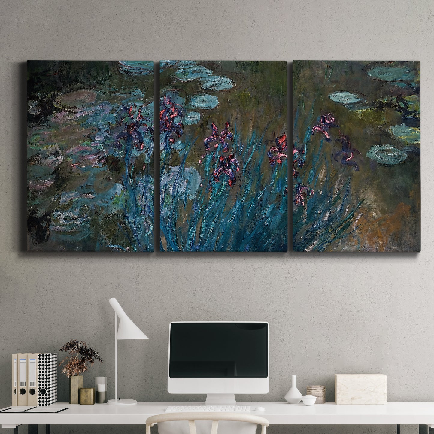 Three-panel canvas wall art featuring water lilies on reflective pond, displayed above a desk in a home office.