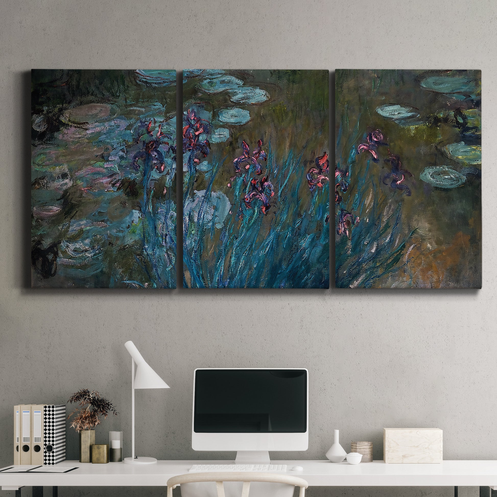Three-panel canvas wall art featuring water lilies on reflective pond, displayed above a desk in a home office.