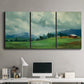 Three-panel canvas wall art featuring wide pastoral valley landscape, displayed above a desk in a home office.