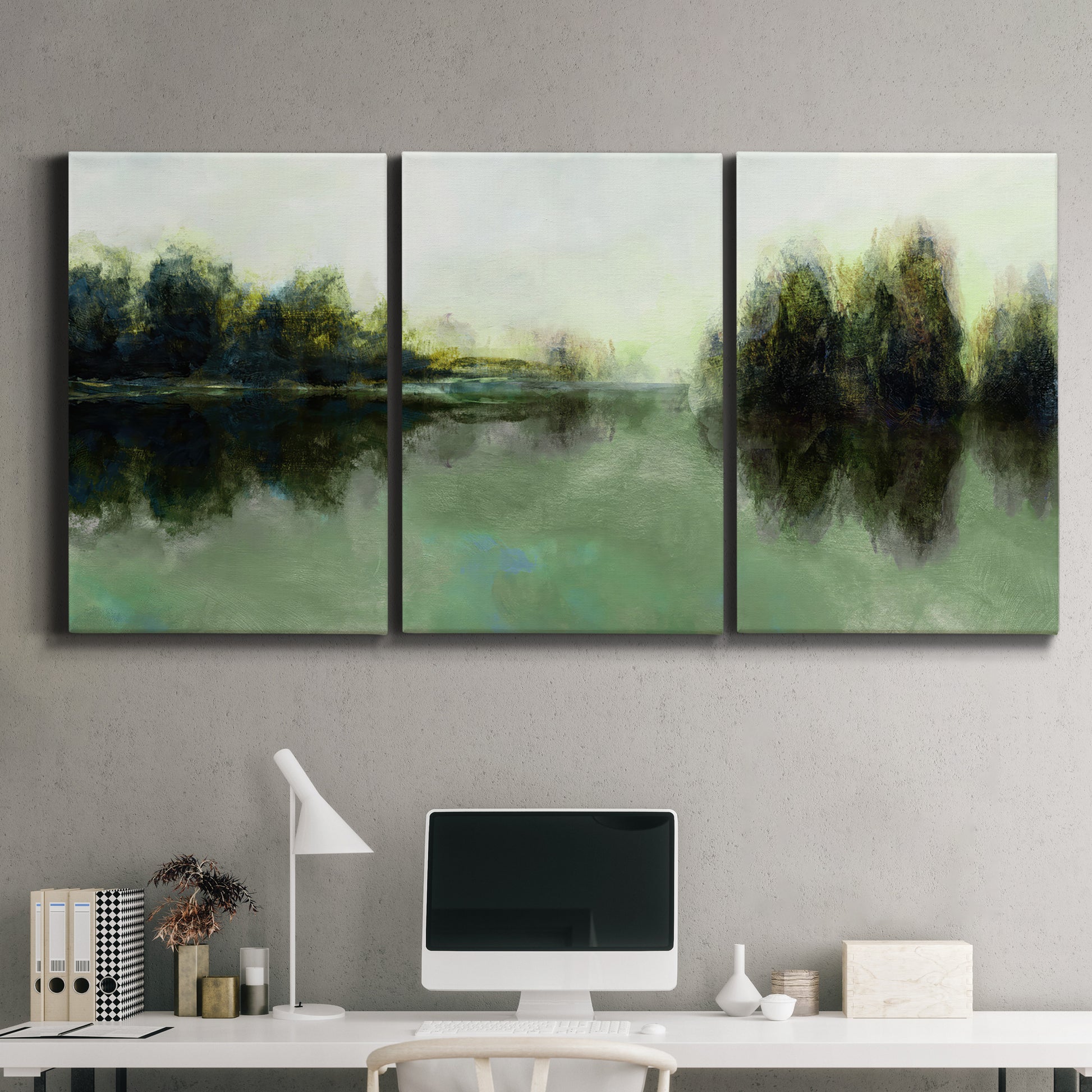 Three-panel canvas wall art featuring rain soaked landscape at sunset, displayed above a desk in a home office.