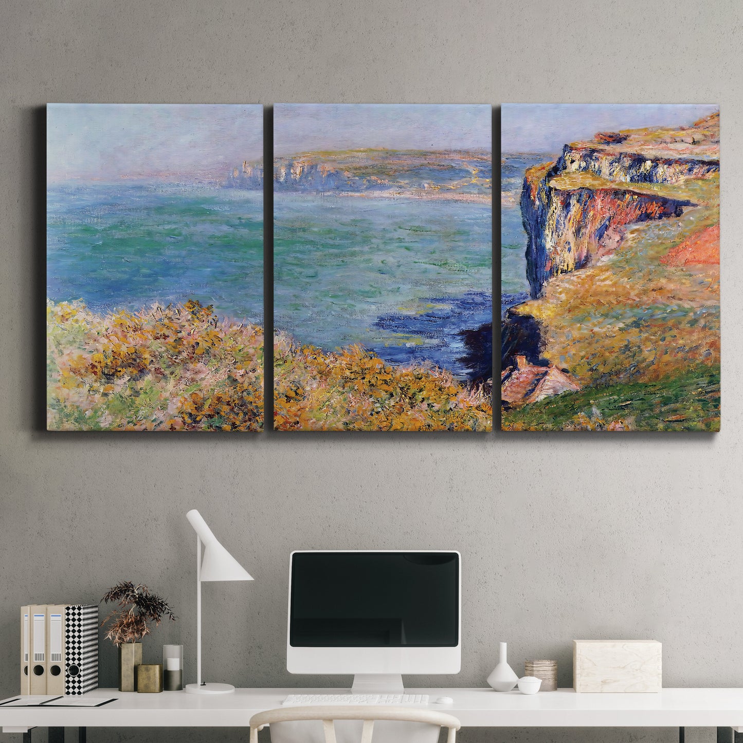 Three-panel canvas wall art featuring coastal village view near dieppe, displayed above a desk in a home office.
