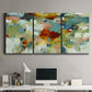 Three-panel canvas wall art featuring celebratory abstract color movement, displayed above a desk in a home office.