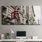 Three-panel canvas wall art featuring london street scene photograph, displayed above a desk in a home office.