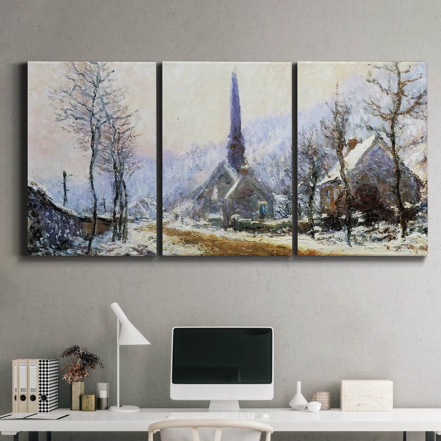 Three-panel canvas wall art featuring snow covered road leading to village, displayed above a desk in a home office.