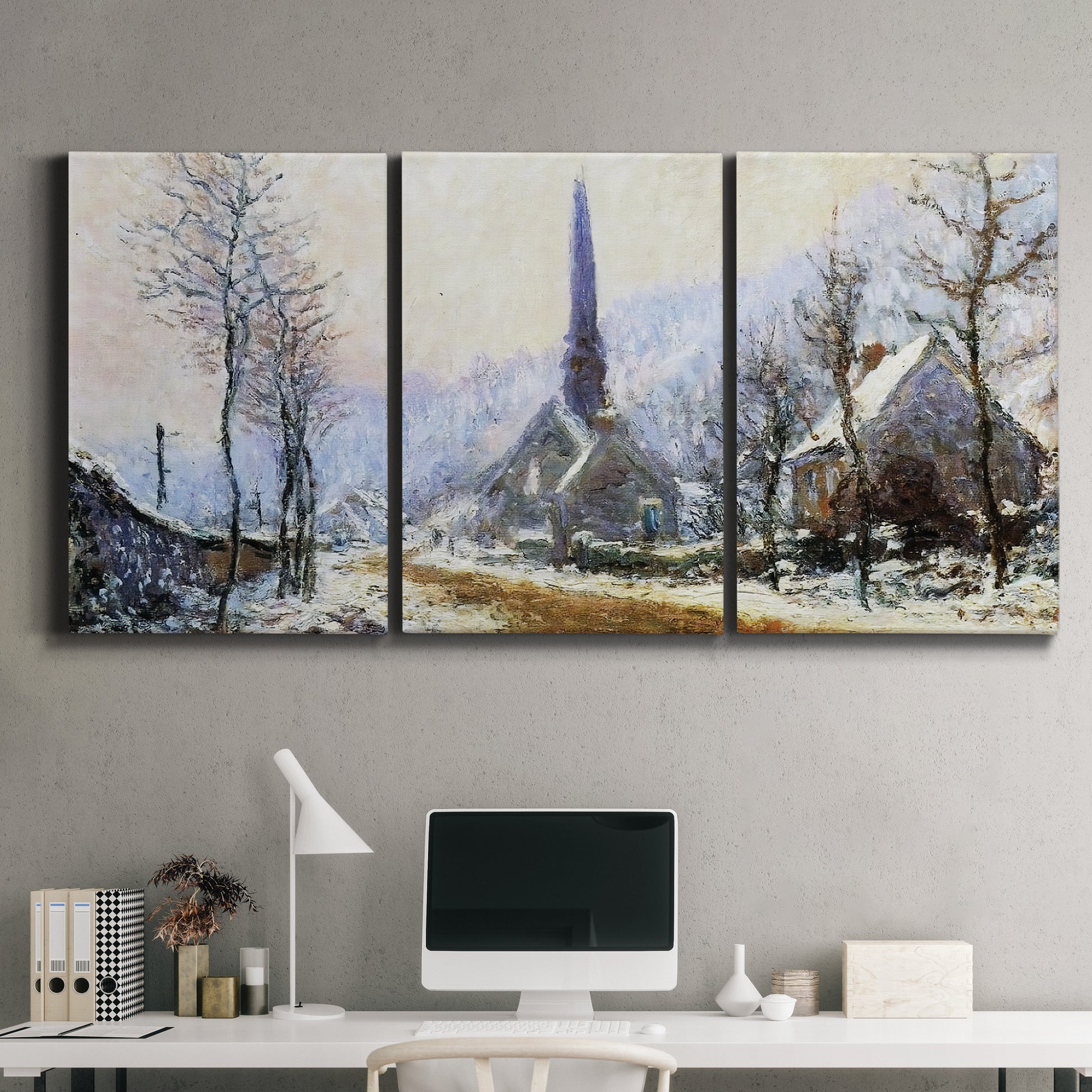 Three-panel canvas wall art featuring snow covered road leading to village, displayed above a desk in a home office.