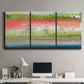 Three-panel canvas wall art featuring layered abstract color banding, displayed above a desk in a home office.