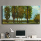 Three-panel canvas wall art featuring tall trees lining open landscape, displayed above a desk in a home office.