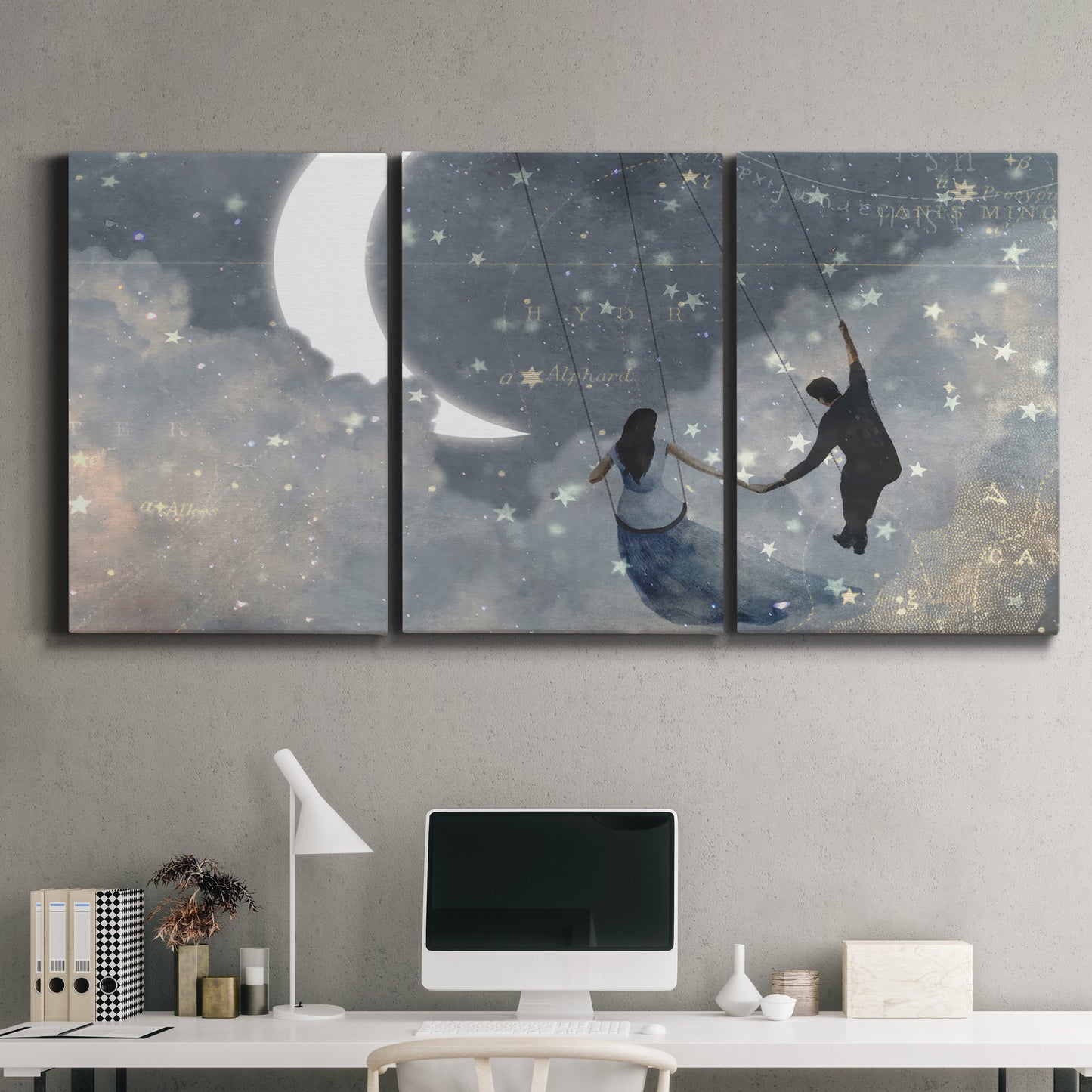 Three-panel canvas wall art featuring surreal celestial romantic scene, displayed above a desk in a home office.