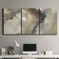 Three-panel canvas wall art featuring flowing abstract wave motion, displayed above a desk in a home office.