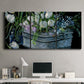 Three-panel canvas wall art featuring colorful wild tulips in bloom, displayed above a desk in a home office.