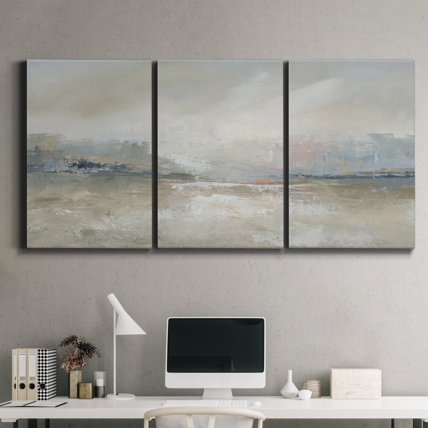 Three-panel canvas wall art featuring soft abstract horizon haze, displayed above a desk in a home office.