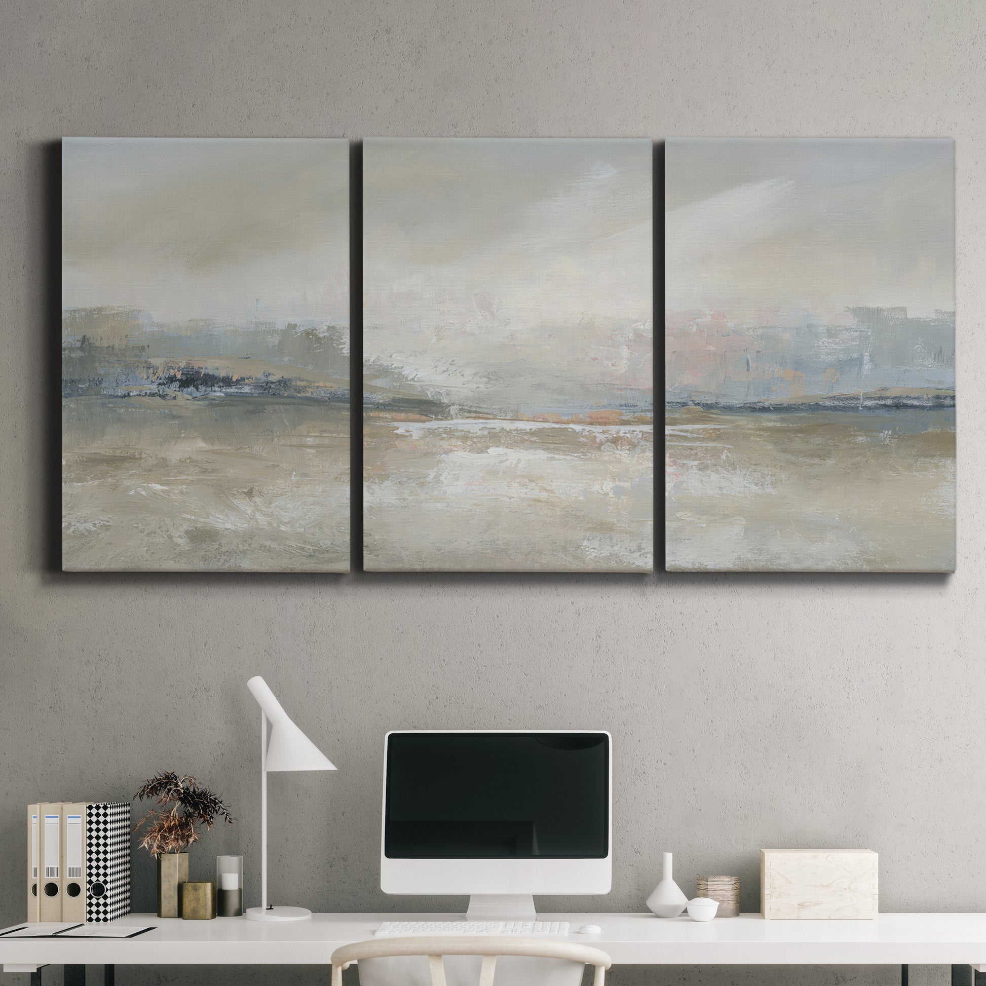 Three-panel canvas wall art featuring soft abstract horizon haze, displayed above a desk in a home office.