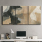 Three-panel canvas wall art featuring blurred mixed media abstract collage, displayed above a desk in a home office.