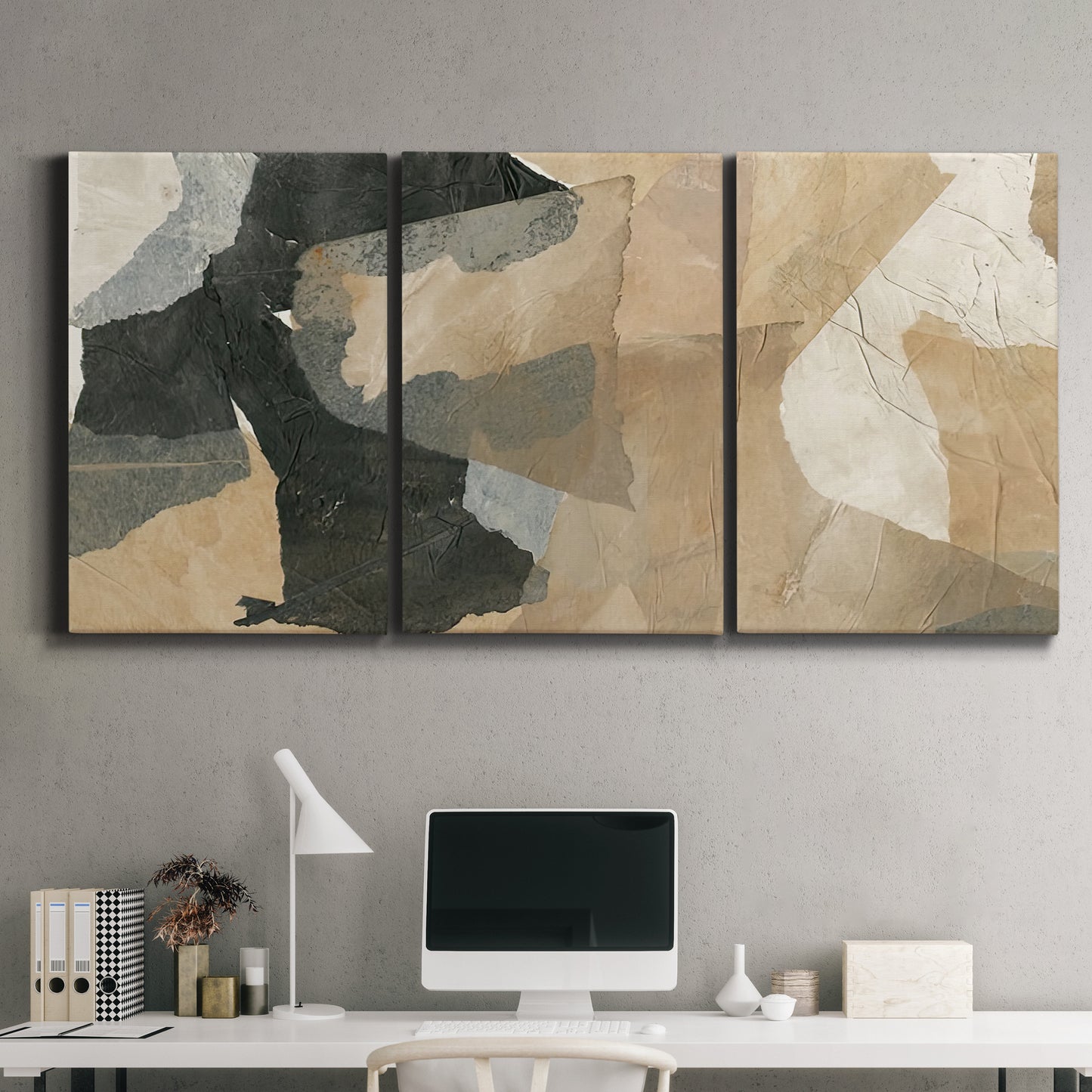 Three-panel canvas wall art featuring blurred mixed media abstract collage, displayed above a desk in a home office.