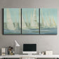 Three-panel canvas wall art featuring sailboats silhouetted at sunrise, displayed above a desk in a home office.