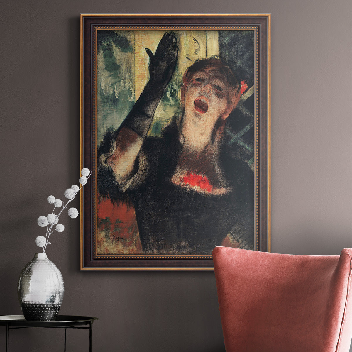 Impressionist portrait of a café singer by Edgar Degas in an ornate bronzed mahogany wood frame displayed in a neutral interior setting.