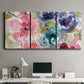 Three-panel canvas wall art featuring soft floral watercolor composition, displayed above a desk in a home office.