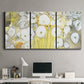Three-panel canvas wall art featuring vintage inspired floral abstraction, displayed above a desk in a home office.