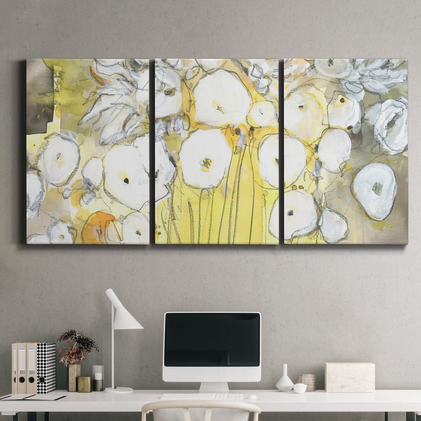 Three-panel canvas wall art featuring vintage inspired floral abstraction, displayed above a desk in a home office.