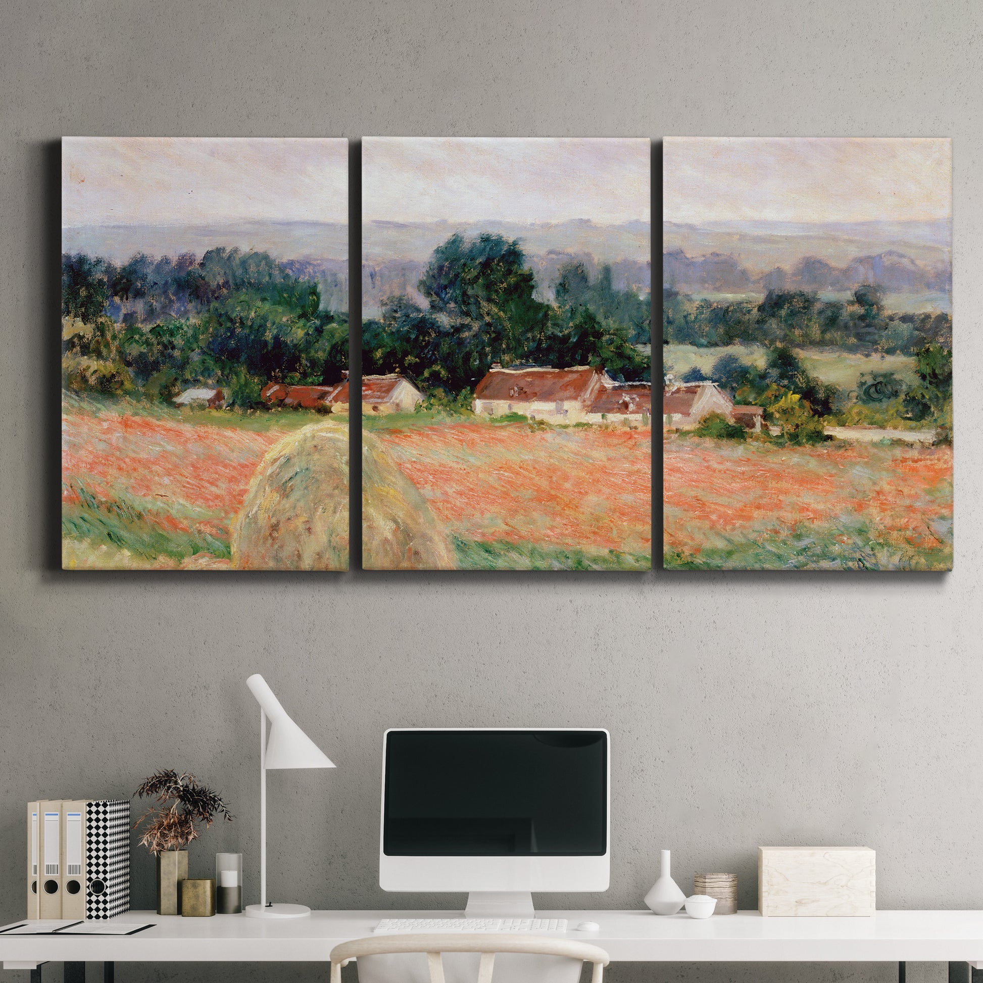 Three-panel canvas wall art featuring haystacks arranged in rural field, displayed above a desk in a home office.