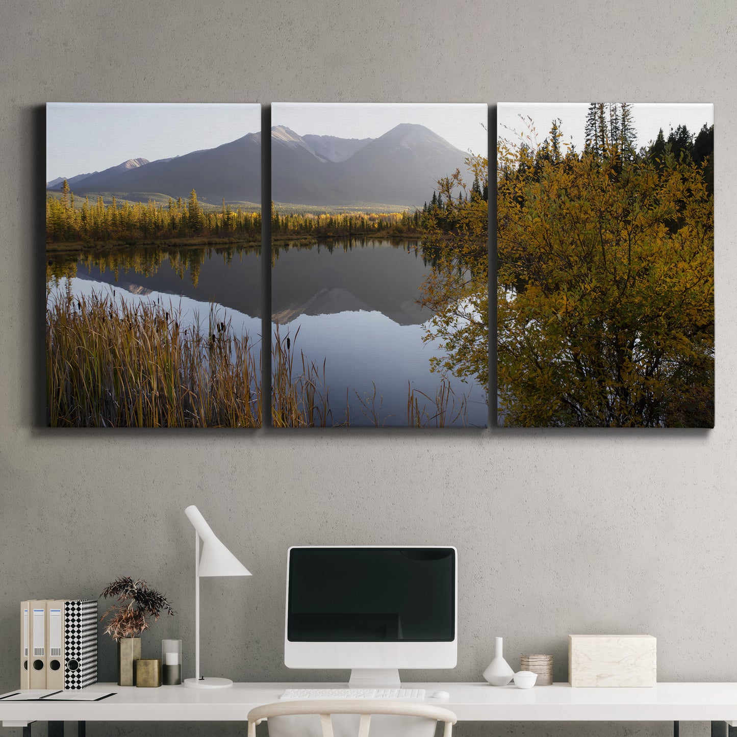 Three-panel canvas wall art featuring low light river photography, displayed above a desk in a home office.