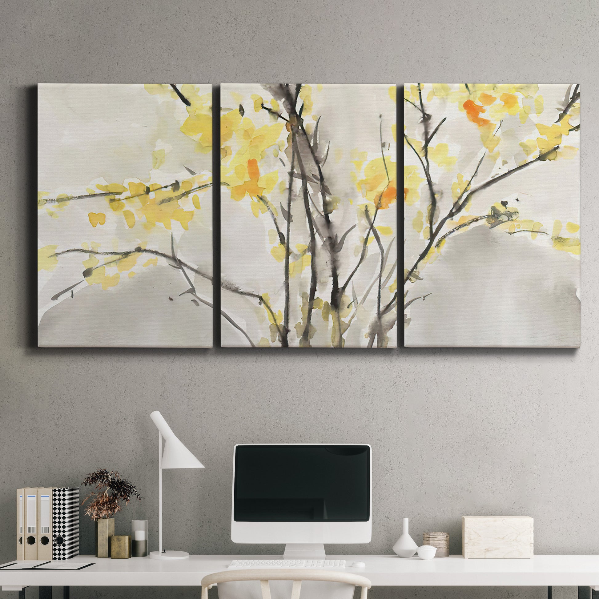 Three-panel canvas wall art featuring soft floral abstract harmony, displayed above a desk in a home office.