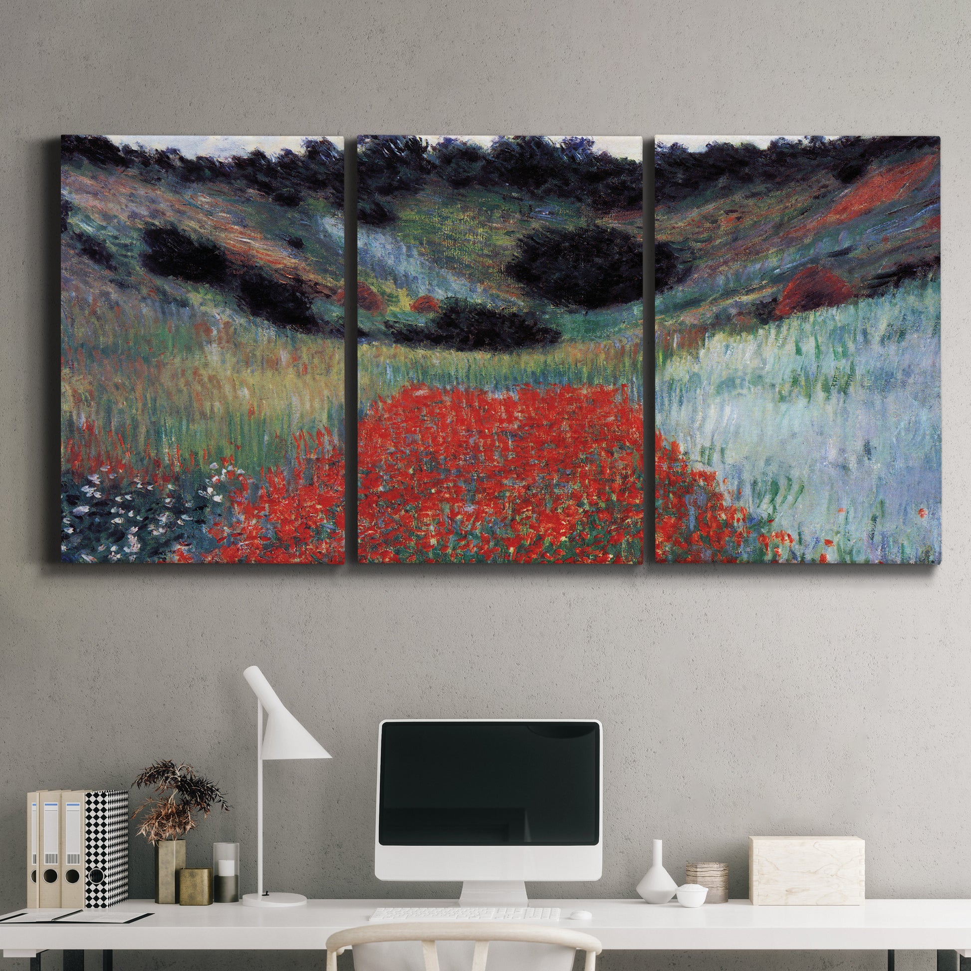 Three-panel canvas wall art featuring poppy field in shallow valley, displayed above a desk in a home office.