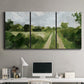 Three-panel canvas wall art featuring meadow trail through open grassland, displayed above a desk in a home office.