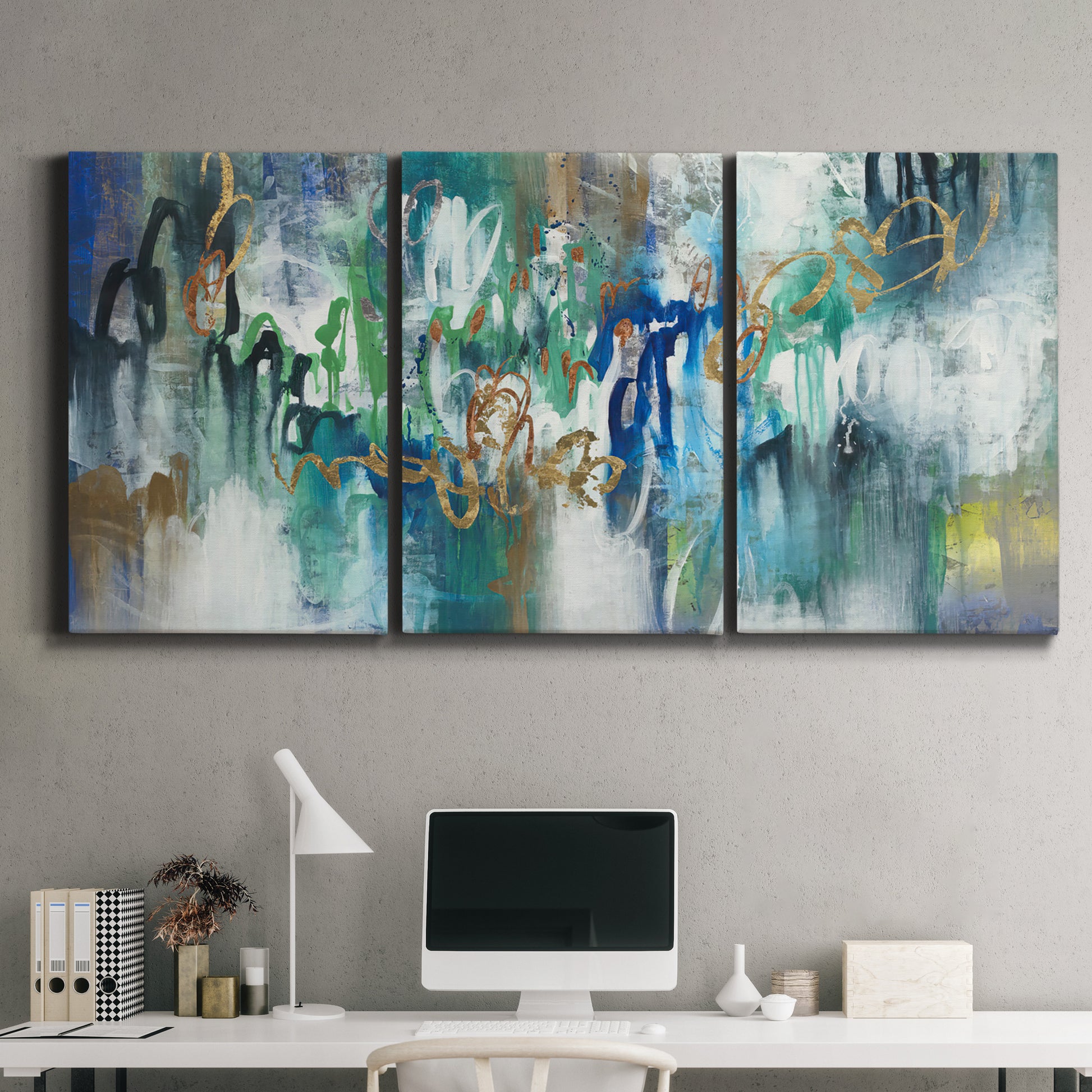 Three-panel canvas wall art featuring joyful abstract color harmony, displayed above a desk in a home office.