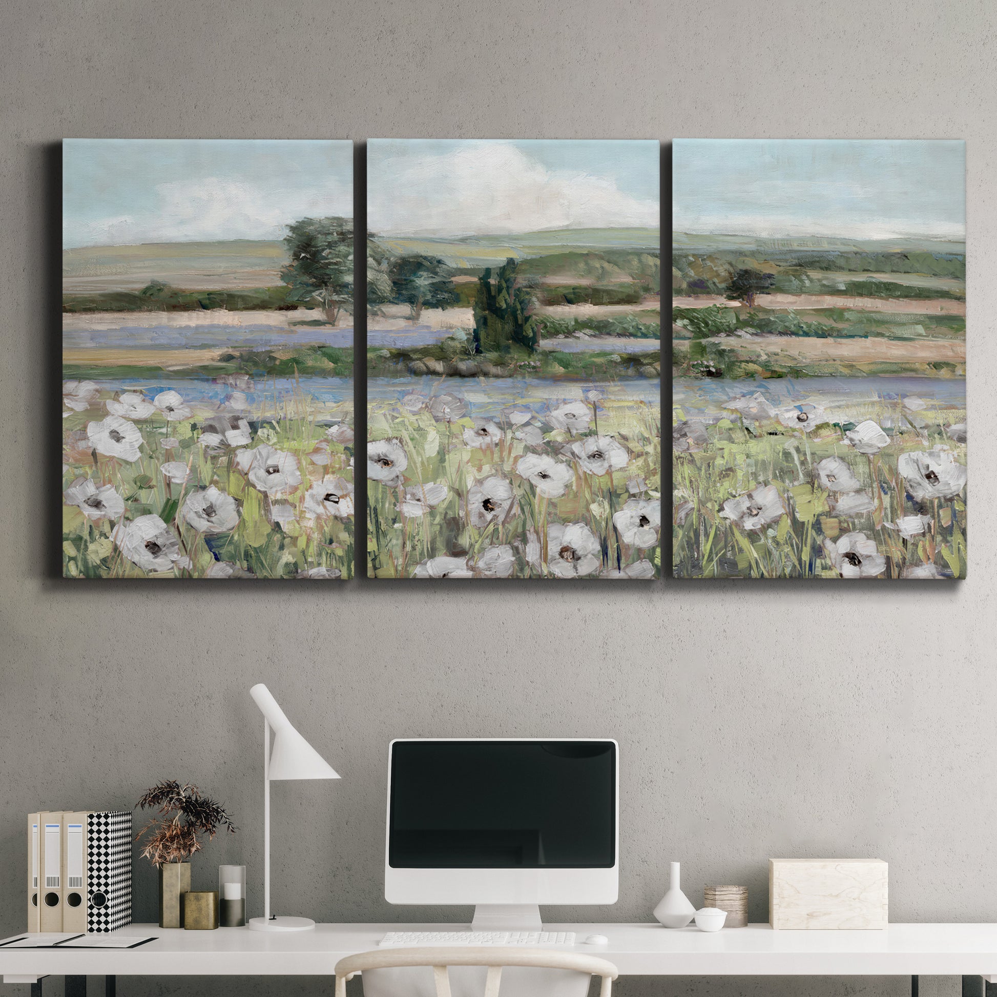 Three-panel canvas wall art featuring vintage poppy filled valley, displayed above a desk in a home office.