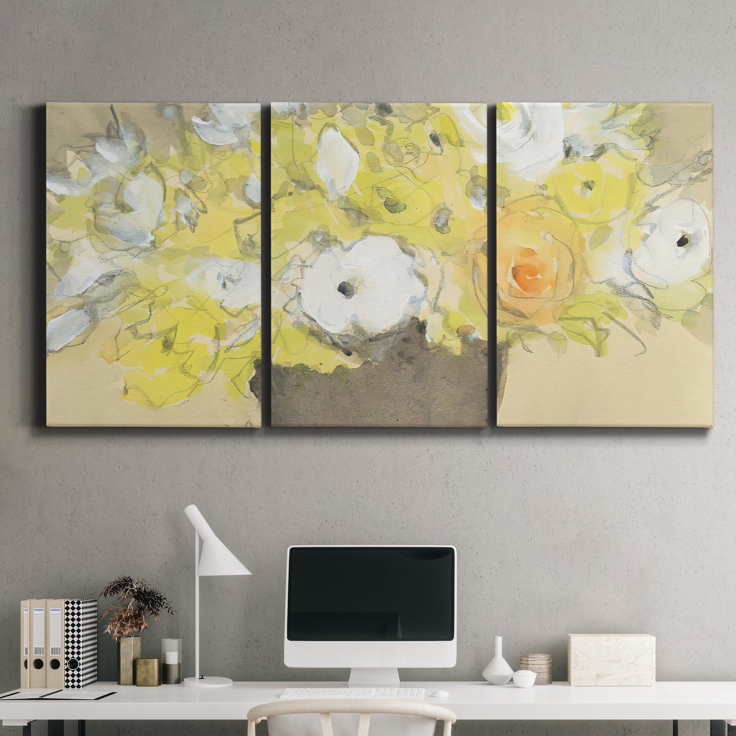Three-panel canvas wall art featuring abstract floral table arrangement, displayed above a desk in a home office.