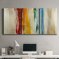 Three-panel canvas wall art featuring abstract divided color hemisphere forms, displayed above a desk in a home office.