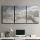 Three-panel canvas wall art featuring aerial landscape view photograph, displayed above a desk in a home office.