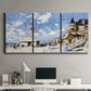 Three-panel canvas wall art featuring beach boardwalk with figures, displayed above a desk in a home office.