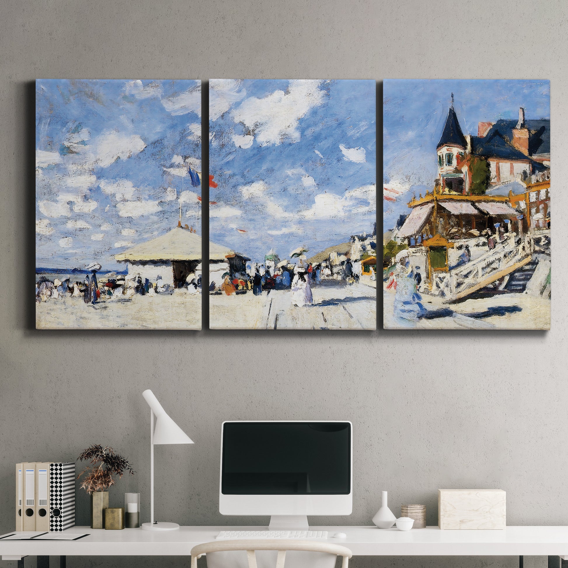 Three-panel canvas wall art featuring beach boardwalk with figures, displayed above a desk in a home office.