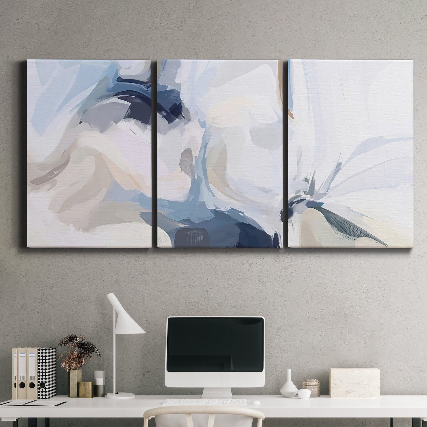 Three-panel canvas wall art featuring airy abstract movement composition, displayed above a desk in a home office.