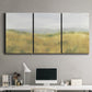 Three-panel canvas wall art featuring pastoral wheat field landscape, displayed above a desk in a home office.